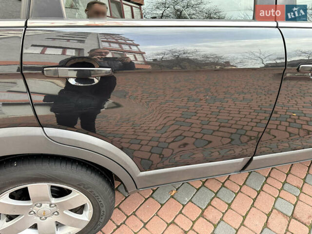 Черный Шевроле Каптива, объемом двигателя 2.38 л и пробегом 210 тыс. км за 11350 $, фото 102 на Automoto.ua