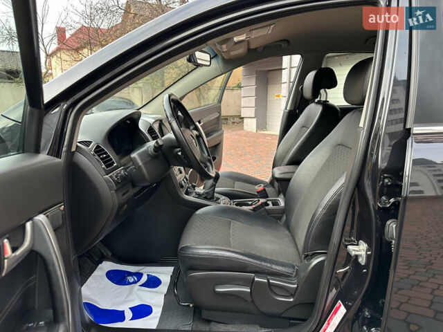 Черный Шевроле Каптива, объемом двигателя 2.38 л и пробегом 210 тыс. км за 11350 $, фото 109 на Automoto.ua