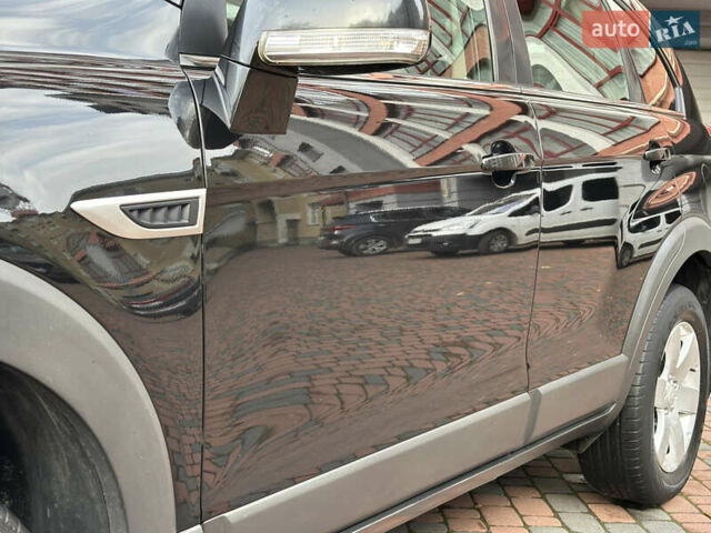 Черный Шевроле Каптива, объемом двигателя 2.38 л и пробегом 210 тыс. км за 11350 $, фото 44 на Automoto.ua