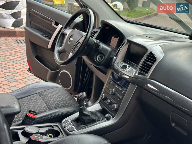 Черный Шевроле Каптива, объемом двигателя 2.38 л и пробегом 210 тыс. км за 11350 $, фото 150 на Automoto.ua