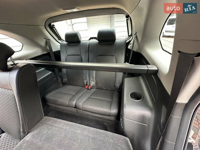 Черный Шевроле Каптива, объемом двигателя 2.38 л и пробегом 210 тыс. км за 11350 $, фото 174 на Automoto.ua