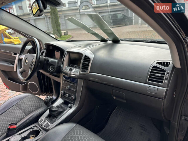 Черный Шевроле Каптива, объемом двигателя 2.38 л и пробегом 210 тыс. км за 11350 $, фото 149 на Automoto.ua