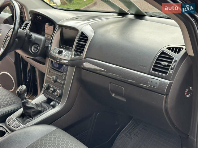 Черный Шевроле Каптива, объемом двигателя 2.38 л и пробегом 210 тыс. км за 11350 $, фото 151 на Automoto.ua