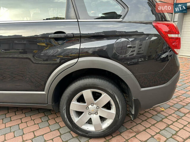 Черный Шевроле Каптива, объемом двигателя 2.38 л и пробегом 210 тыс. км за 11350 $, фото 61 на Automoto.ua