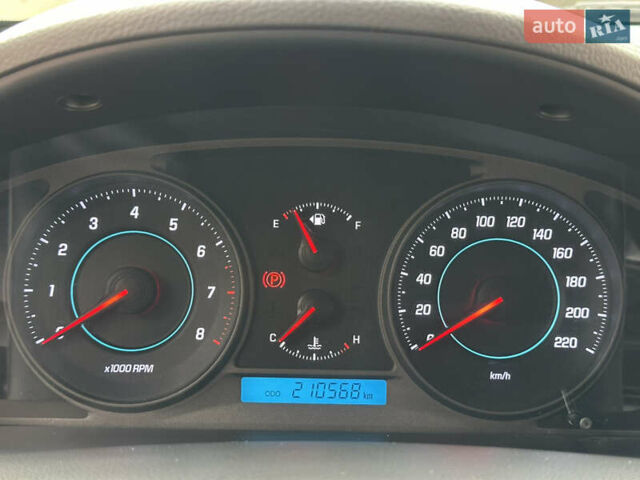 Черный Шевроле Каптива, объемом двигателя 2.38 л и пробегом 210 тыс. км за 11350 $, фото 119 на Automoto.ua