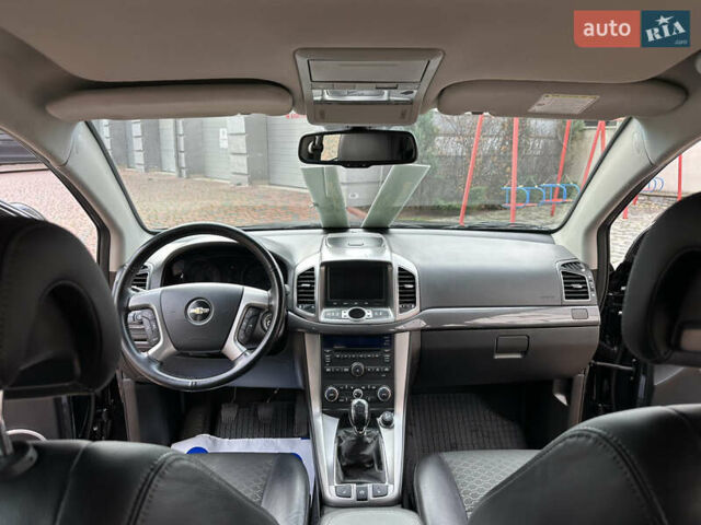 Черный Шевроле Каптива, объемом двигателя 2.38 л и пробегом 210 тыс. км за 11350 $, фото 140 на Automoto.ua