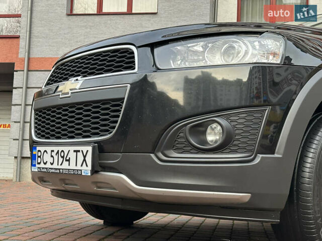 Черный Шевроле Каптива, объемом двигателя 2.38 л и пробегом 210 тыс. км за 11350 $, фото 75 на Automoto.ua