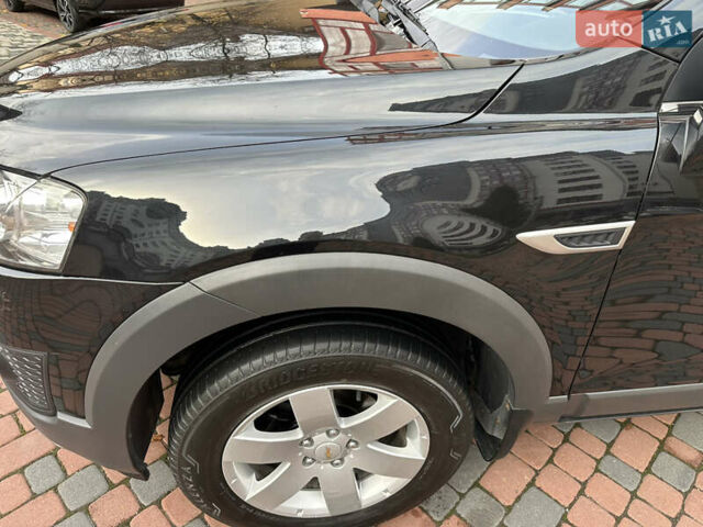 Черный Шевроле Каптива, объемом двигателя 2.38 л и пробегом 210 тыс. км за 11350 $, фото 96 на Automoto.ua