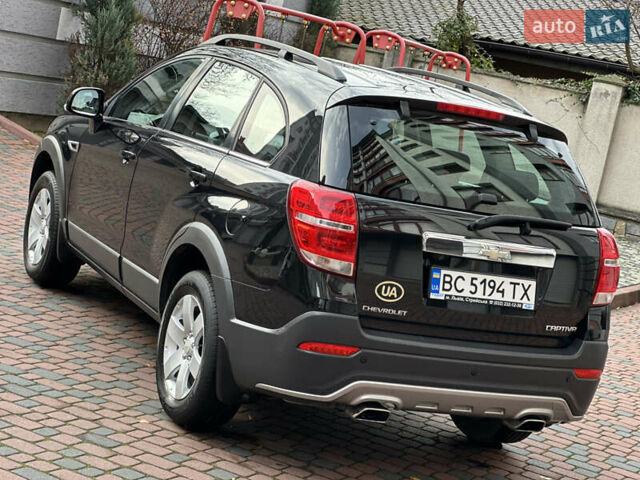 Черный Шевроле Каптива, объемом двигателя 2.38 л и пробегом 210 тыс. км за 11350 $, фото 3 на Automoto.ua