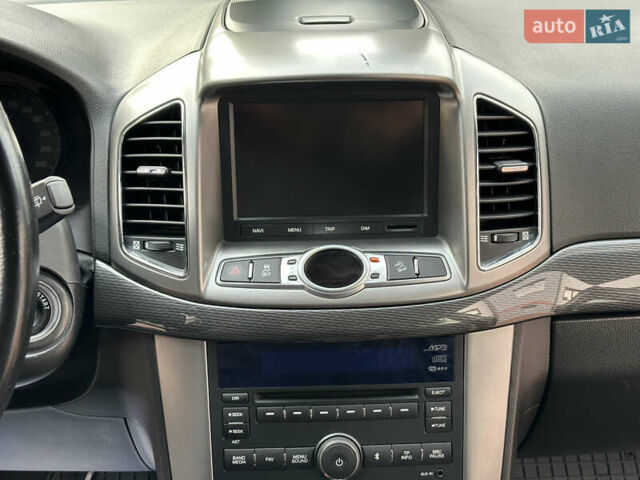 Черный Шевроле Каптива, объемом двигателя 2.38 л и пробегом 210 тыс. км за 11350 $, фото 117 на Automoto.ua