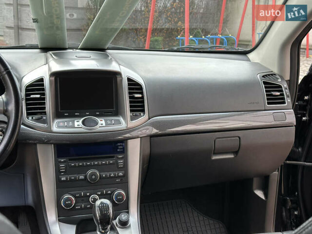 Черный Шевроле Каптива, объемом двигателя 2.38 л и пробегом 210 тыс. км за 11350 $, фото 143 на Automoto.ua