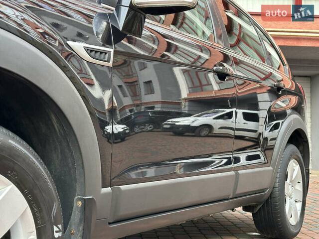 Черный Шевроле Каптива, объемом двигателя 2.38 л и пробегом 210 тыс. км за 11350 $, фото 45 на Automoto.ua