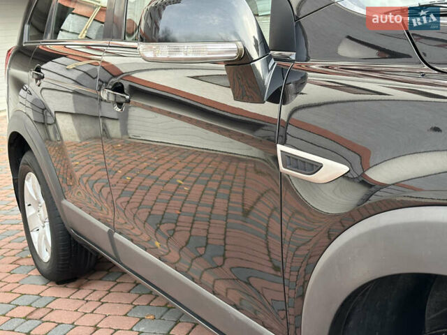 Черный Шевроле Каптива, объемом двигателя 2.38 л и пробегом 210 тыс. км за 11350 $, фото 48 на Automoto.ua