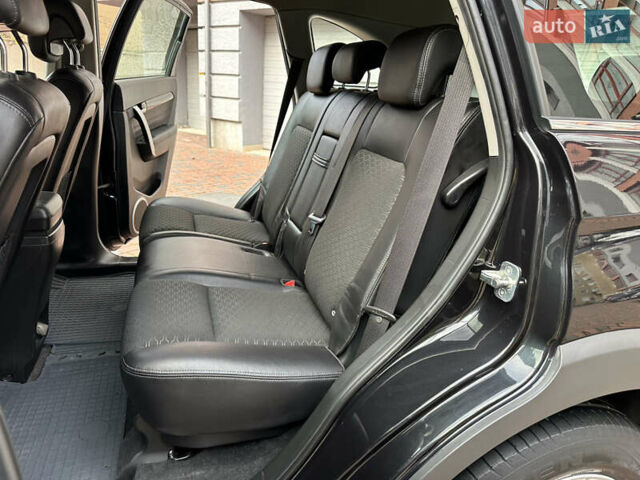 Черный Шевроле Каптива, объемом двигателя 2.38 л и пробегом 210 тыс. км за 11350 $, фото 165 на Automoto.ua