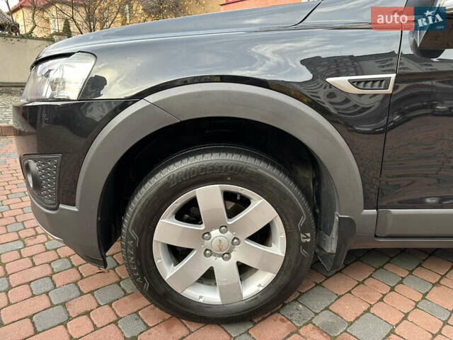 Черный Шевроле Каптива, объемом двигателя 2.38 л и пробегом 210 тыс. км за 11350 $, фото 60 на Automoto.ua