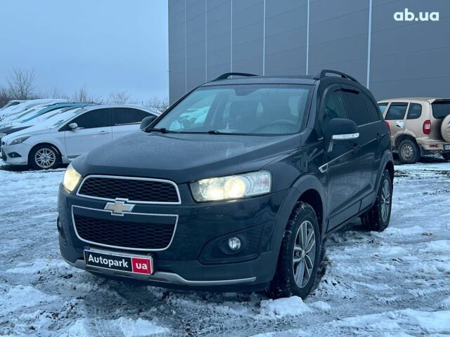 Черный Шевроле Каптива, объемом двигателя 2.2 л и пробегом 157 тыс. км за 12990 $, фото 1 на Automoto.ua