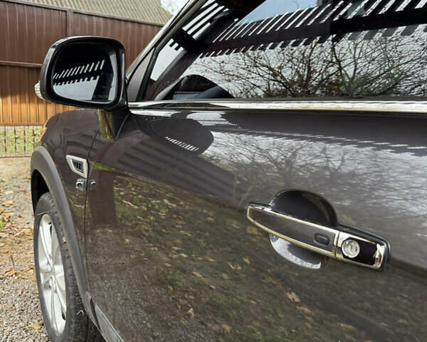 Черный Шевроле Каптива, объемом двигателя 2.2 л и пробегом 113 тыс. км за 12900 $, фото 14 на Automoto.ua