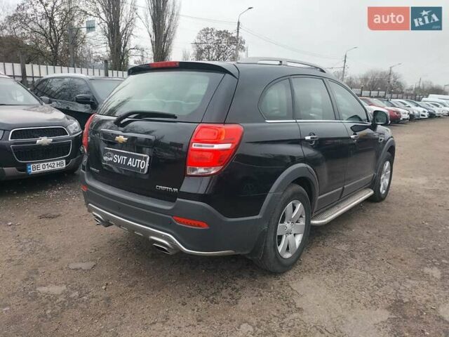 Черный Шевроле Каптива, объемом двигателя 2.38 л и пробегом 172 тыс. км за 12000 $, фото 3 на Automoto.ua