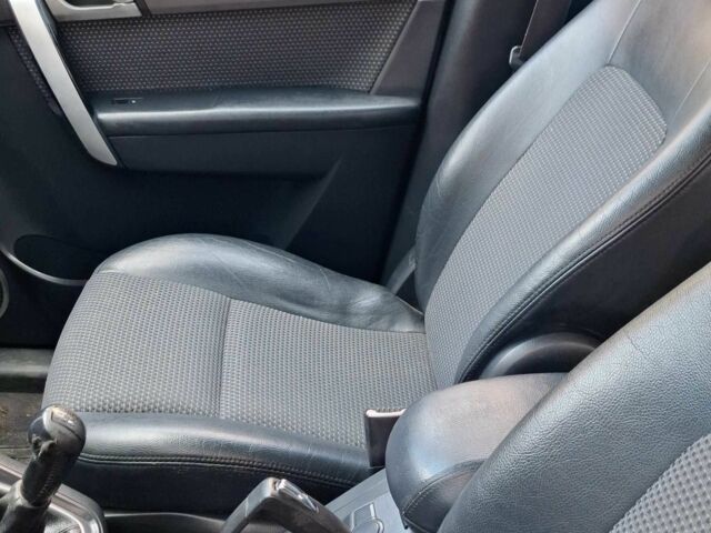 Красный Шевроле Каптива, объемом двигателя 2 л и пробегом 190 тыс. км за 3650 $, фото 8 на Automoto.ua