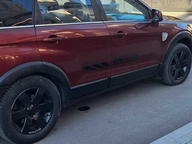 Красный Шевроле Каптива, объемом двигателя 2 л и пробегом 190 тыс. км за 3650 $, фото 16 на Automoto.ua