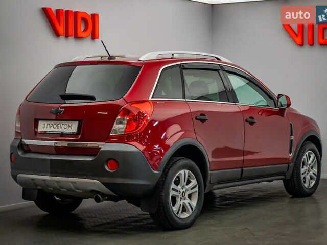 Красный Шевроле Каптива, объемом двигателя 2.4 л и пробегом 207 тыс. км за 9270 $, фото 1 на Automoto.ua