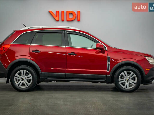 Красный Шевроле Каптива, объемом двигателя 2.4 л и пробегом 207 тыс. км за 9270 $, фото 3 на Automoto.ua