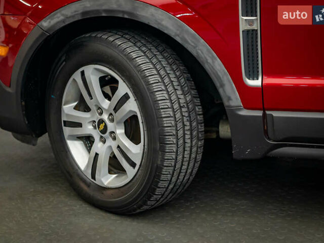 Красный Шевроле Каптива, объемом двигателя 2.4 л и пробегом 207 тыс. км за 9270 $, фото 7 на Automoto.ua