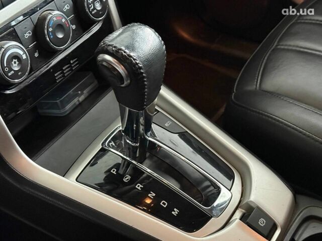 Красный Шевроле Каптива, объемом двигателя 2.4 л и пробегом 120 тыс. км за 8990 $, фото 11 на Automoto.ua