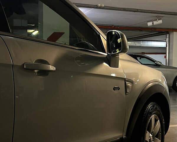 Серый Шевроле Каптива, объемом двигателя 2.4 л и пробегом 240 тыс. км за 4999 $, фото 5 на Automoto.ua