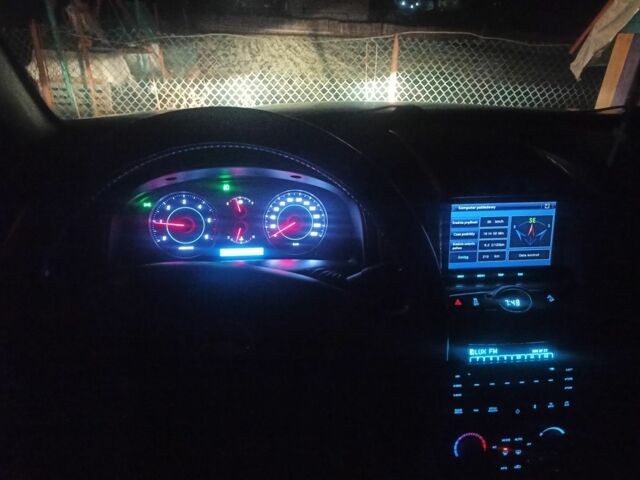 Серый Шевроле Каптива, объемом двигателя 2.2 л и пробегом 230 тыс. км за 10799 $, фото 2 на Automoto.ua