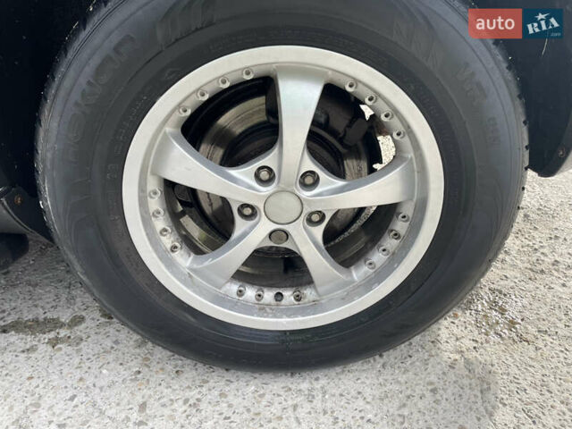 Серый Шевроле Каптива, объемом двигателя 2.38 л и пробегом 250 тыс. км за 10800 $, фото 3 на Automoto.ua