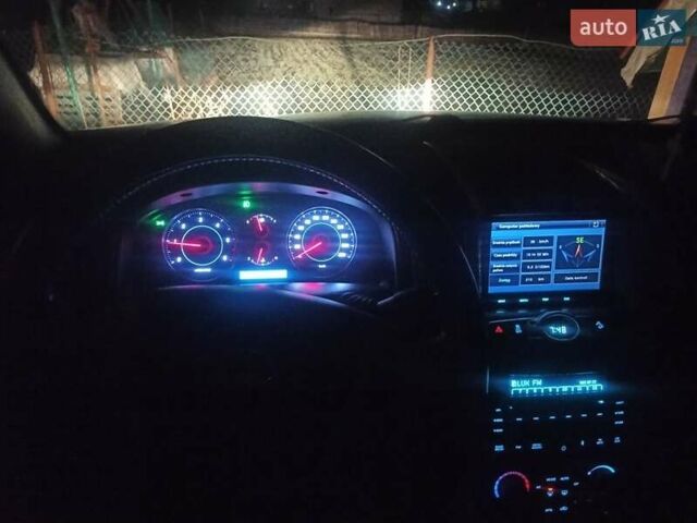 Серый Шевроле Каптива, объемом двигателя 2.2 л и пробегом 230 тыс. км за 10799 $, фото 1 на Automoto.ua