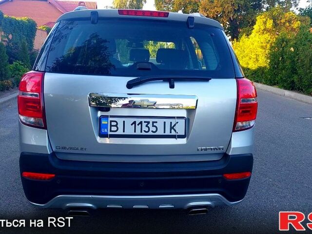 Серый Шевроле Каптива, объемом двигателя 2.4 л и пробегом 56 тыс. км за 13500 $, фото 4 на Automoto.ua