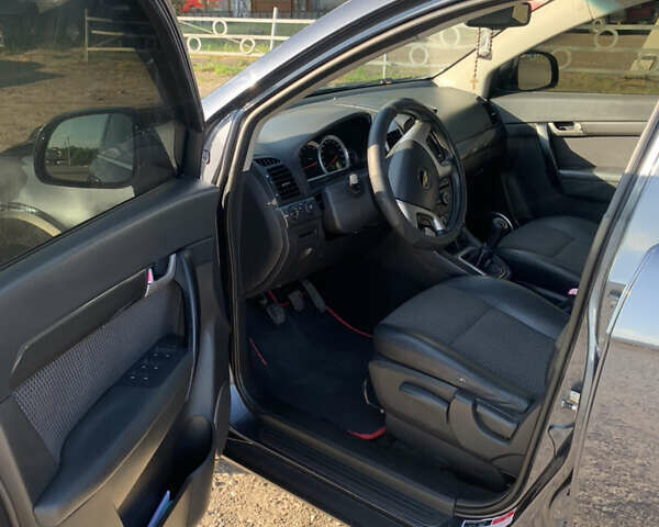 Синий Шевроле Каптива, объемом двигателя 2 л и пробегом 284 тыс. км за 7600 $, фото 18 на Automoto.ua