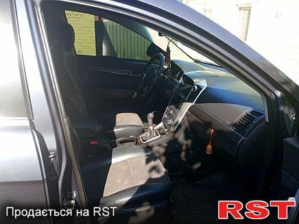 Синий Шевроле Каптива, объемом двигателя 2.4 л и пробегом 209 тыс. км за 8950 $, фото 3 на Automoto.ua