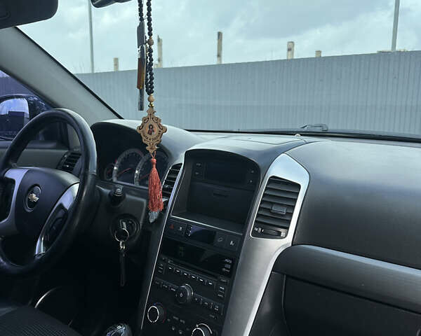 Синий Шевроле Каптива, объемом двигателя 2.41 л и пробегом 376 тыс. км за 7500 $, фото 24 на Automoto.ua