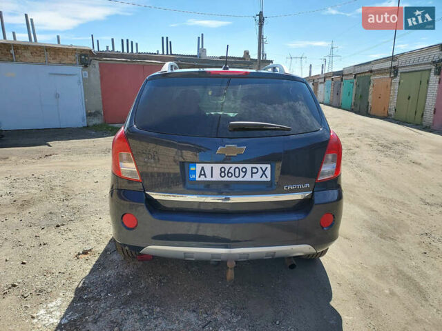 Синій Шевроле Каптіва, об'ємом двигуна 2.4 л та пробігом 288 тис. км за 7700 $, фото 1 на Automoto.ua