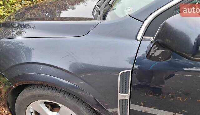 Синий Шевроле Каптива, объемом двигателя 2.38 л и пробегом 220 тыс. км за 10700 $, фото 6 на Automoto.ua