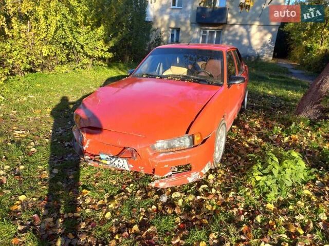 Красный Шевроле Кавалер, объемом двигателя 2.2 л и пробегом 244 тыс. км за 1200 $, фото 2 на Automoto.ua