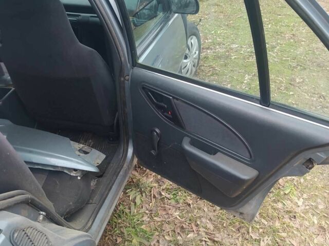 Серый Шевроле Кавалер, объемом двигателя 2 л и пробегом 300 тыс. км за 699 $, фото 18 на Automoto.ua