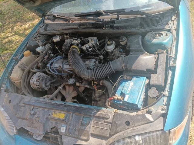 Зеленый Шевроле Кавалер, объемом двигателя 2.2 л и пробегом 360 тыс. км за 600 $, фото 17 на Automoto.ua