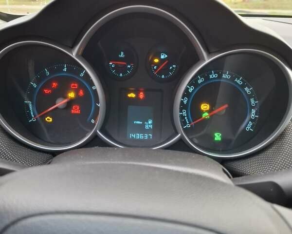 Белый Шевроле Круз, объемом двигателя 1.8 л и пробегом 144 тыс. км за 7500 $, фото 11 на Automoto.ua