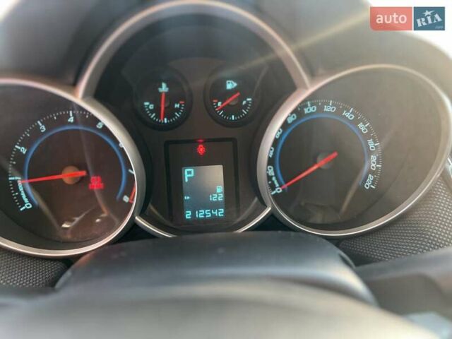 Белый Шевроле Круз, объемом двигателя 1.8 л и пробегом 210 тыс. км за 6650 $, фото 7 на Automoto.ua