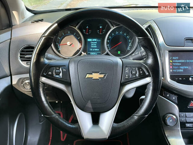 Белый Шевроле Круз, объемом двигателя 1.8 л и пробегом 129 тыс. км за 7990 $, фото 12 на Automoto.ua