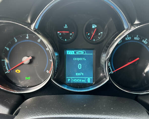 Белый Шевроле Круз, объемом двигателя 1.8 л и пробегом 146 тыс. км за 8700 $, фото 18 на Automoto.ua