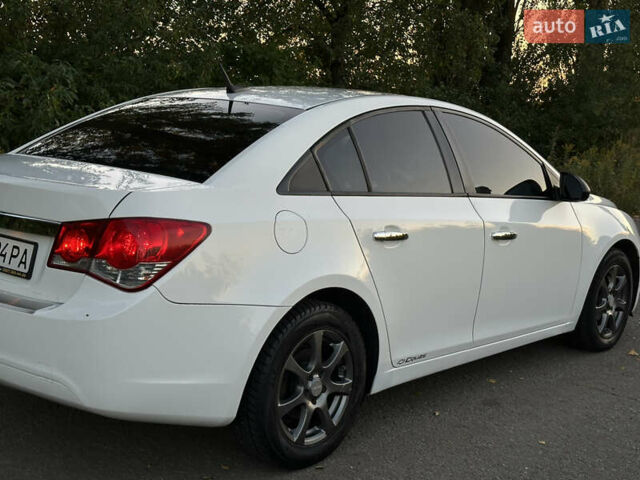 Белый Шевроле Круз, объемом двигателя 1.8 л и пробегом 227 тыс. км за 7000 $, фото 11 на Automoto.ua