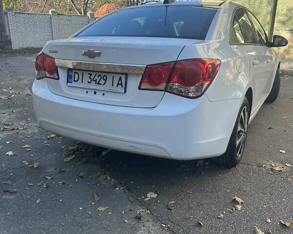 Белый Шевроле Круз, объемом двигателя 1.8 л и пробегом 210 тыс. км за 5999 $, фото 7 на Automoto.ua