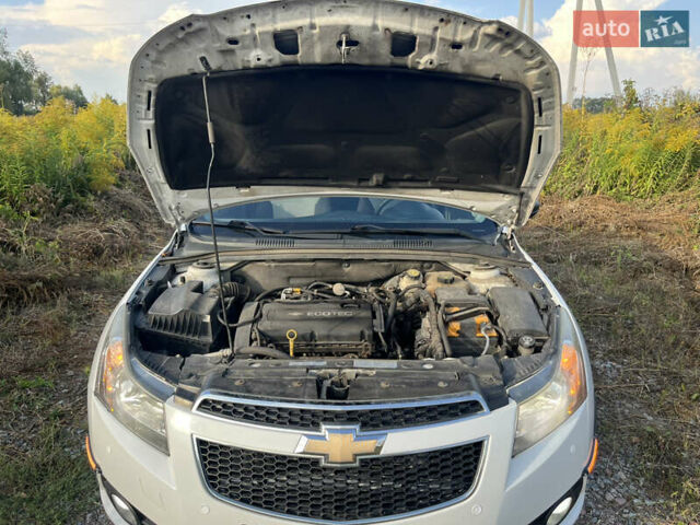 Белый Шевроле Круз, объемом двигателя 1.8 л и пробегом 267 тыс. км за 6790 $, фото 17 на Automoto.ua