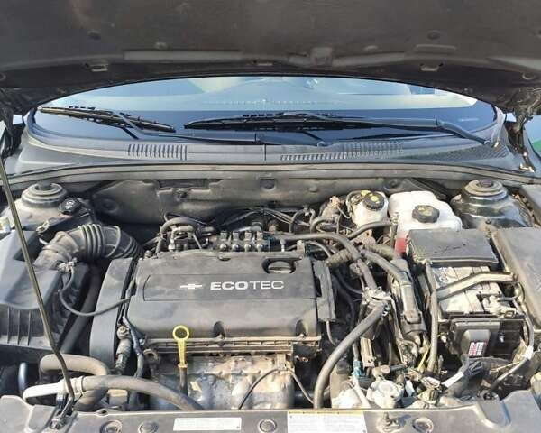 Черный Шевроле Круз, объемом двигателя 1.8 л и пробегом 140 тыс. км за 7000 $, фото 10 на Automoto.ua