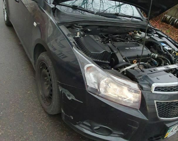 Черный Шевроле Круз, объемом двигателя 1.8 л и пробегом 83 тыс. км за 4500 $, фото 6 на Automoto.ua